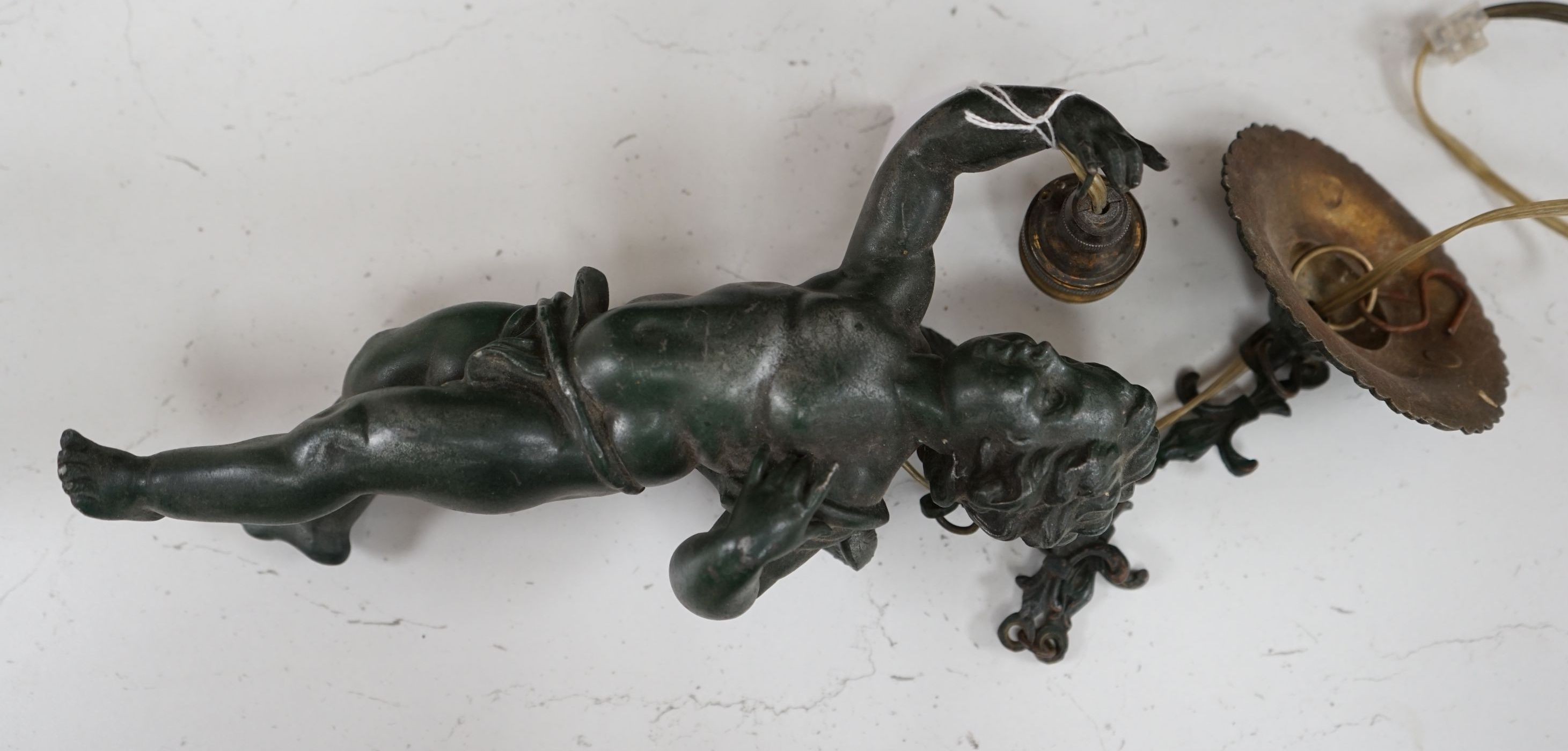 A bronzed spelter putti hanging light